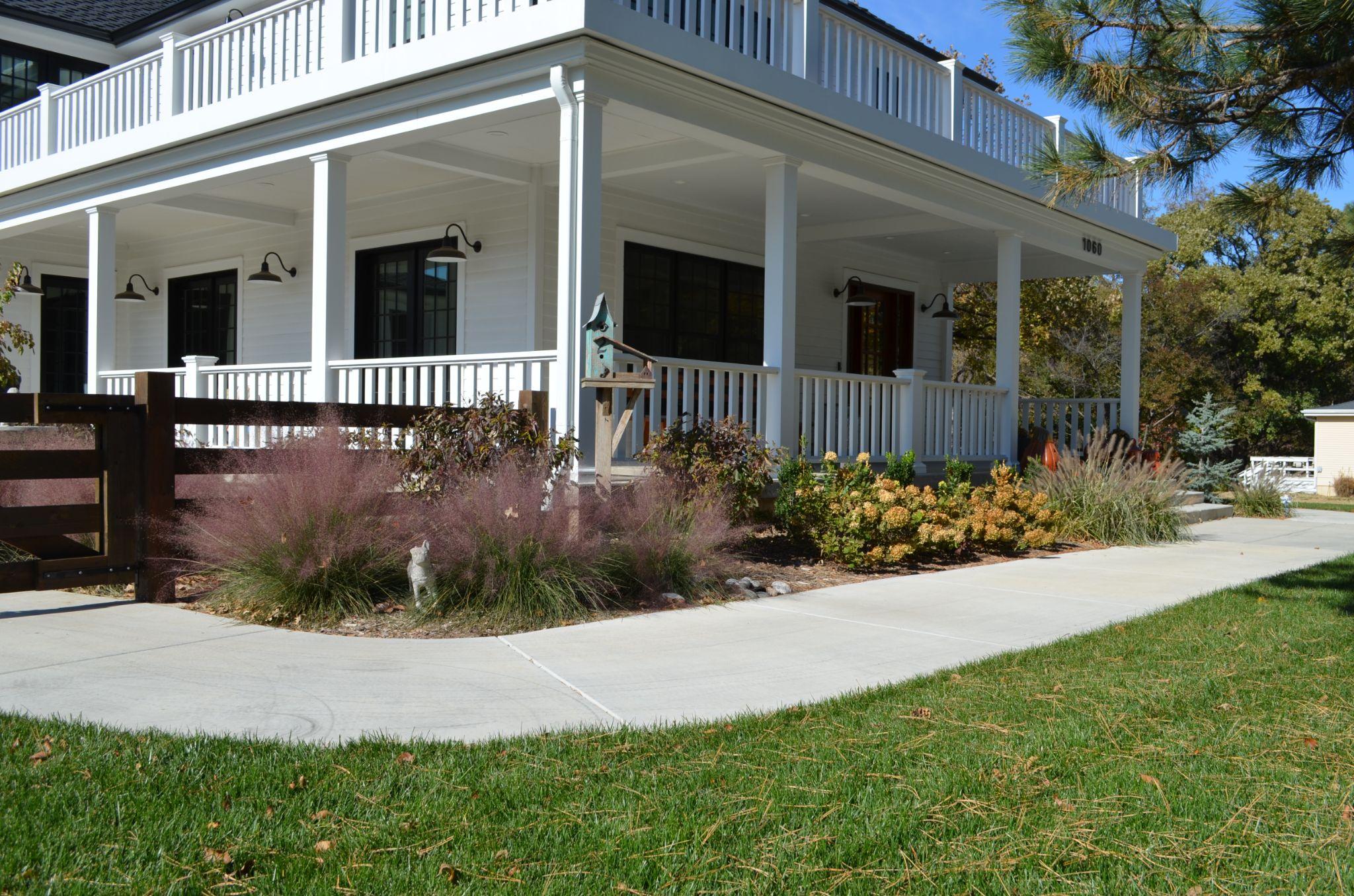 Front porch landscaping with grasses and shrubs